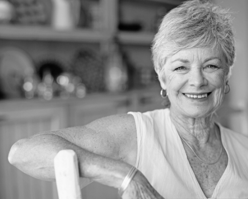 senior woman smiling into camera